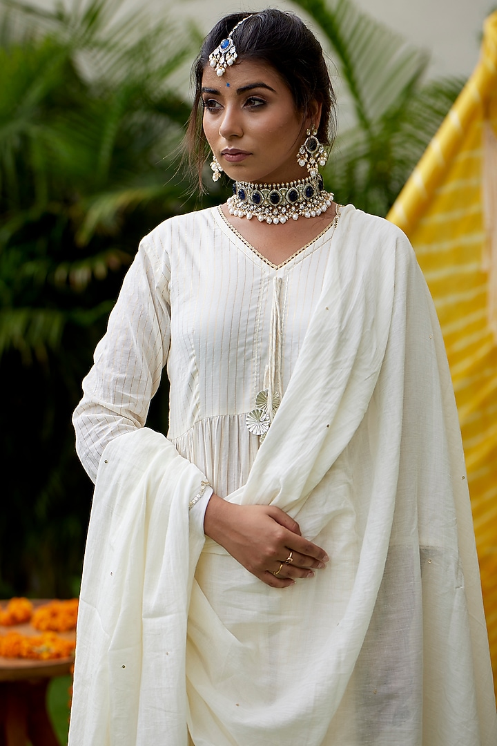 Ivory Hand Embroidered Anarkali Set With Potli by Ruchira Nangalia at Pernia's Pop Up Shop