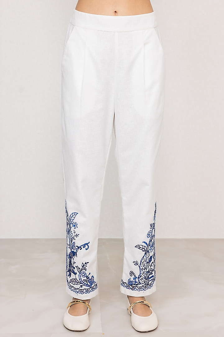 White Poly Flex Embroidered Straight Pants by Ranna Gill at Pernia's Pop Up Shop