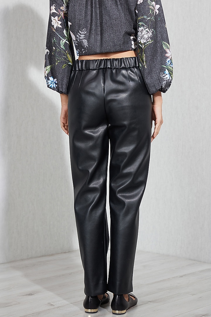Black Faux Leather Straight Pants by Ranna Gill at Pernia's Pop Up Shop