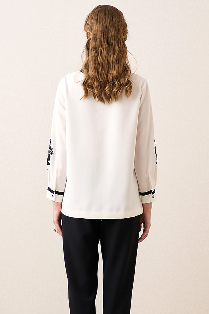 White China Crepe Floral Applique Artwork Top by Ranna Gill at Pernia's Pop Up Shop