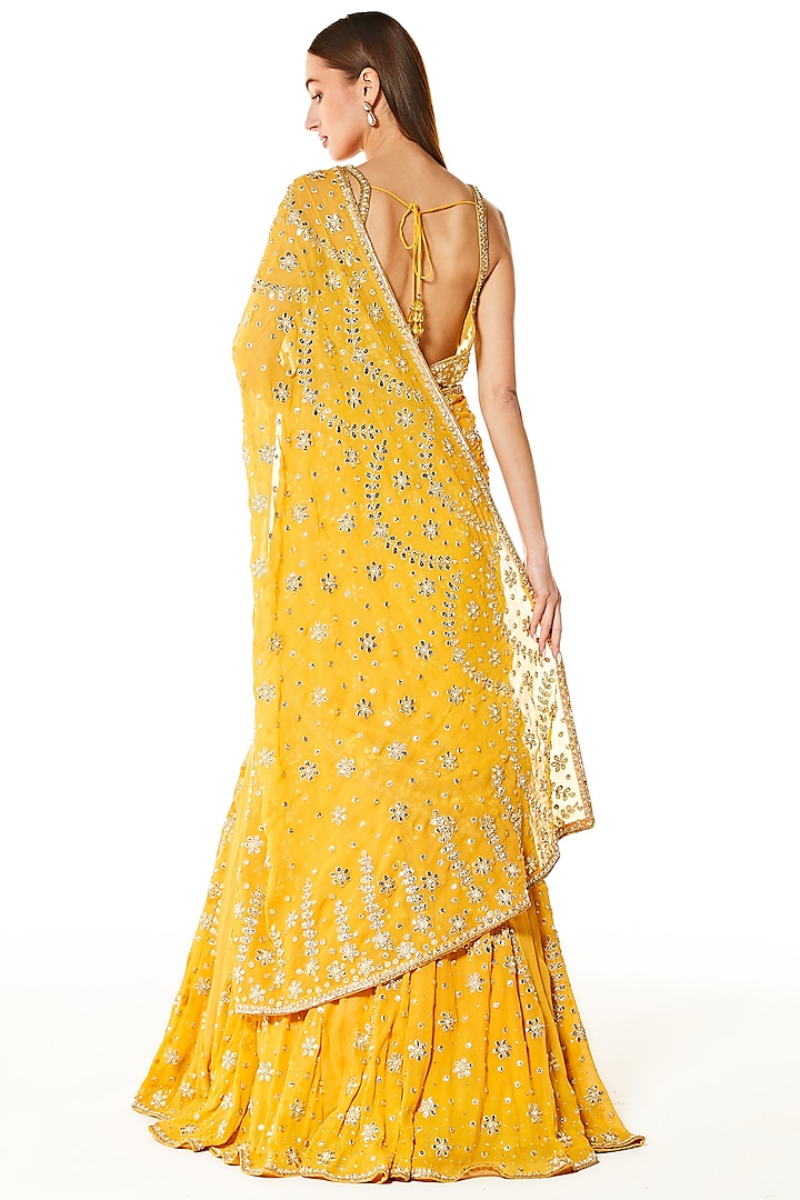 Mustard Yellow Georgette Resham & Sequins Embroidered Reception Lehenga Saree Set
by Rabani & Rakha at Pernia's Pop Up Shop