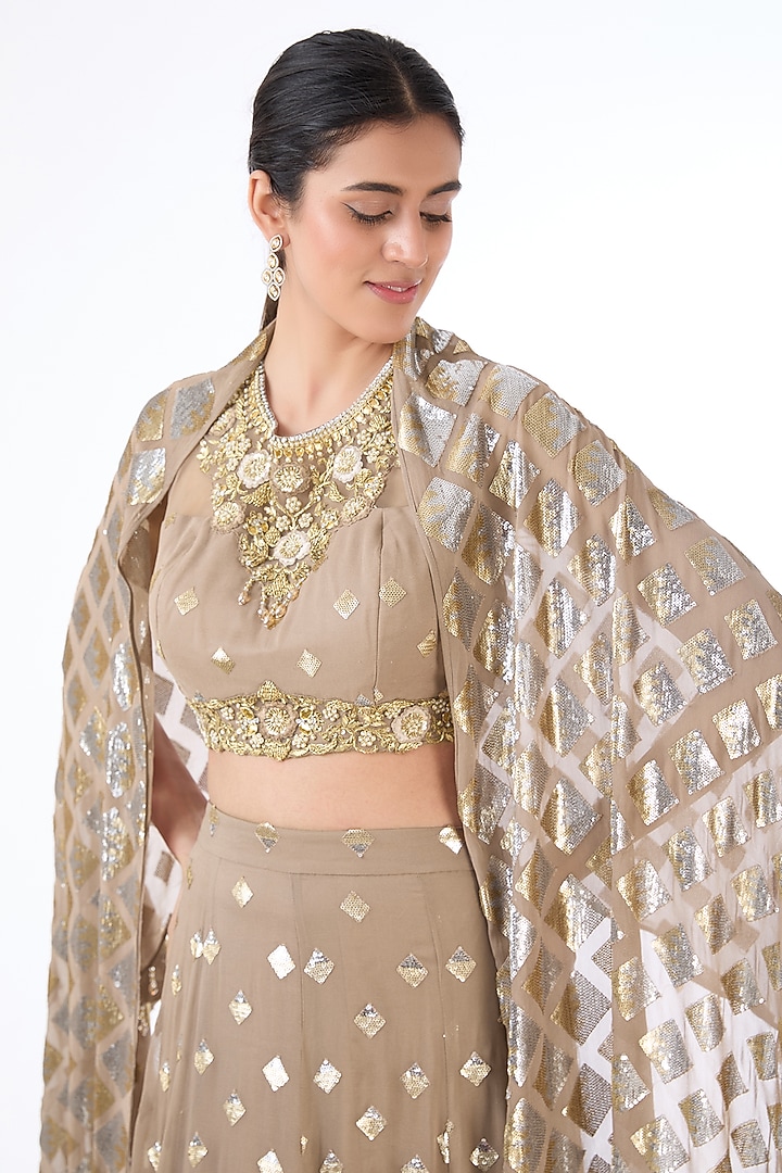 Gold Georgette Sequins Embroidered Bridal Lehenga Set by Rabani & Rakha at Pernia's Pop Up Shop