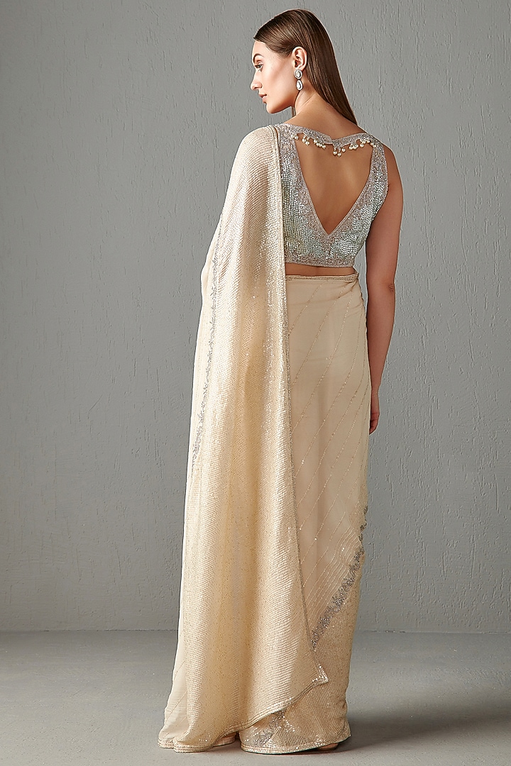 Ivory Embroidered Reception Saree Set by Rabani & Rakha at Pernia's Pop Up Shop