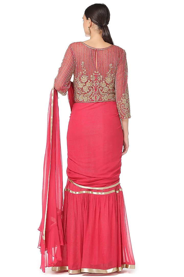 Pink Shimmer Georgette Cutdana Embroidered Tiered Lehenga Set by Rabani & Rakha at Pernia's Pop Up Shop