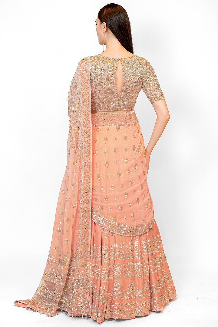 Peach Dupion Silk Sequins Embroidered Bridal Lehenga Set by Rabani & Rakha at Pernia's Pop Up Shop