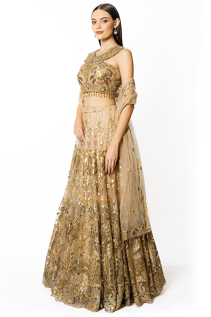 Gold Net Sequins Embroidered Bridal Lehenga Set by Rabani & Rakha at Pernia's Pop Up Shop