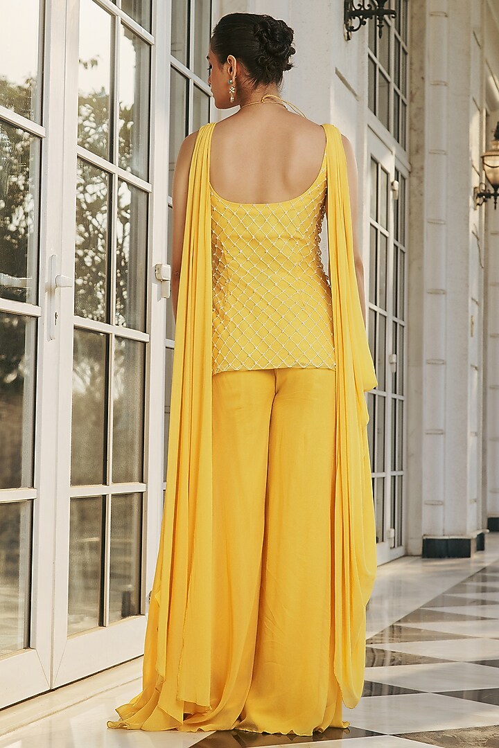 Yellow Georgette & Net Hand Embellished Kurta Set by RINESSA at Pernia's Pop Up Shop