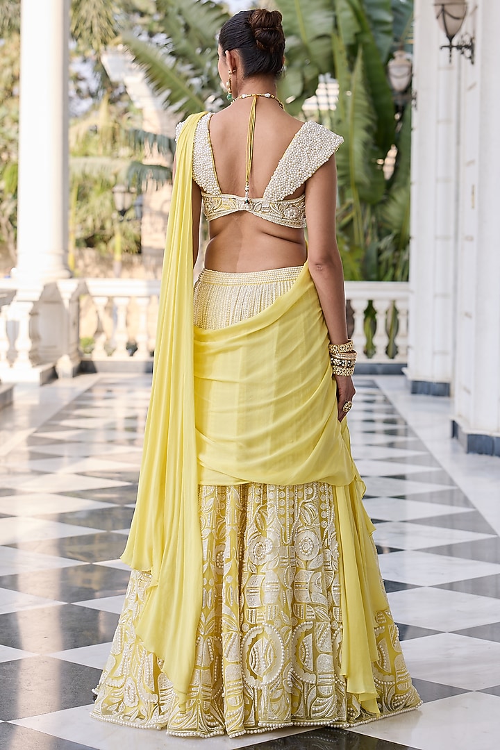 Yellow Satin Georgette & Net Hand Embellished Wedding Lehenga Set by RINESSA at Pernia's Pop Up Shop