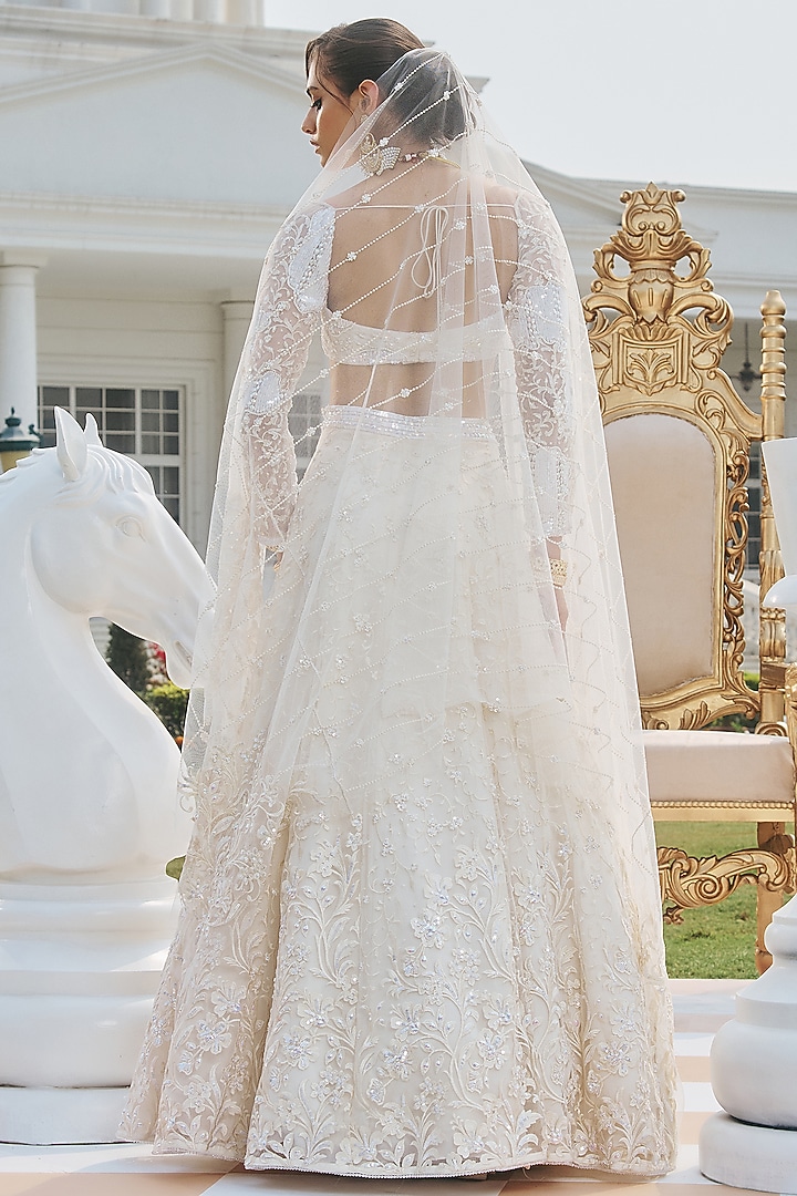 Ivory Net & Shantoon Hand Embroidered Wedding Lehenga Set by RINESSA at Pernia's Pop Up Shop
