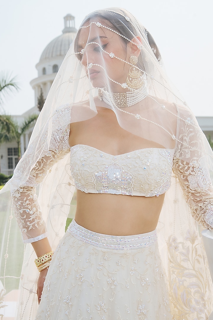 Ivory Net & Shantoon Hand Embroidered Wedding Lehenga Set by RINESSA at Pernia's Pop Up Shop
