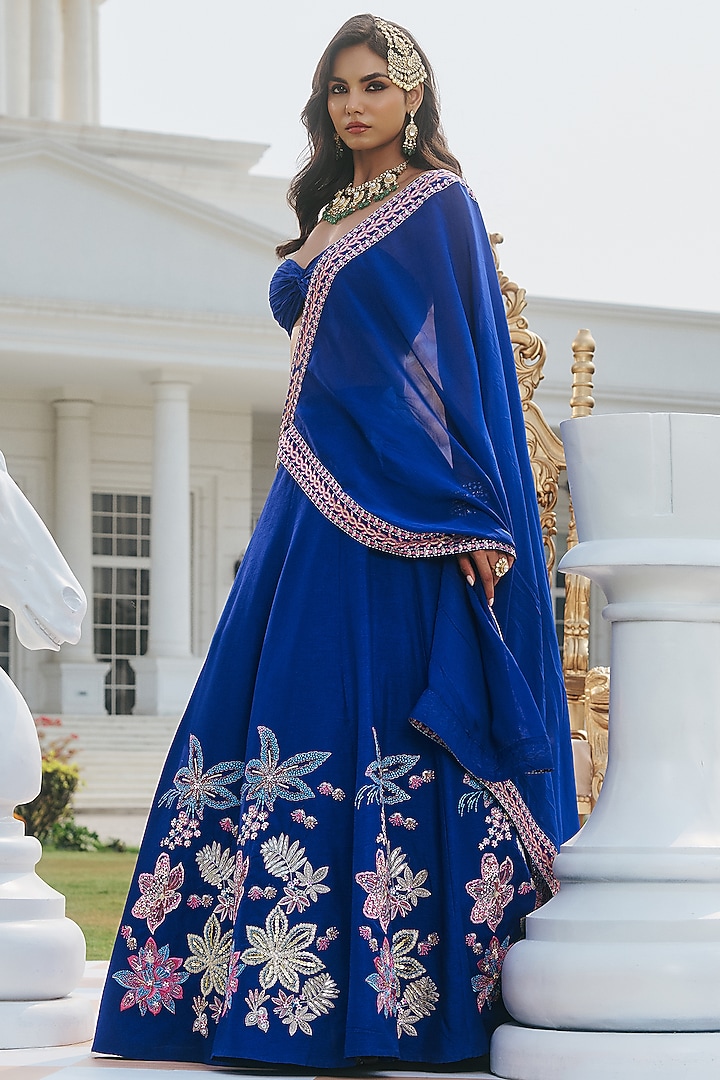 Deep Blue Dupion Silk & Organza Hand Embellished Wedding Lehenga Set by RINESSA at Pernia's Pop Up Shop