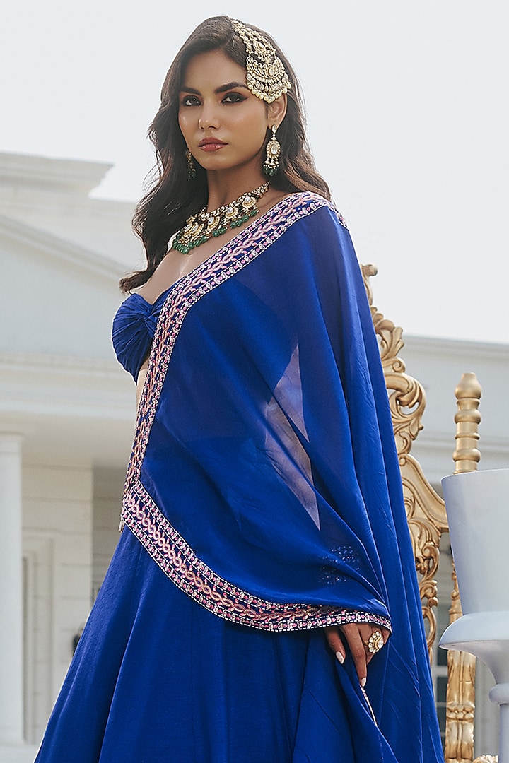 Deep Blue Dupion Silk & Organza Hand Embellished Wedding Lehenga Set by RINESSA at Pernia's Pop Up Shop