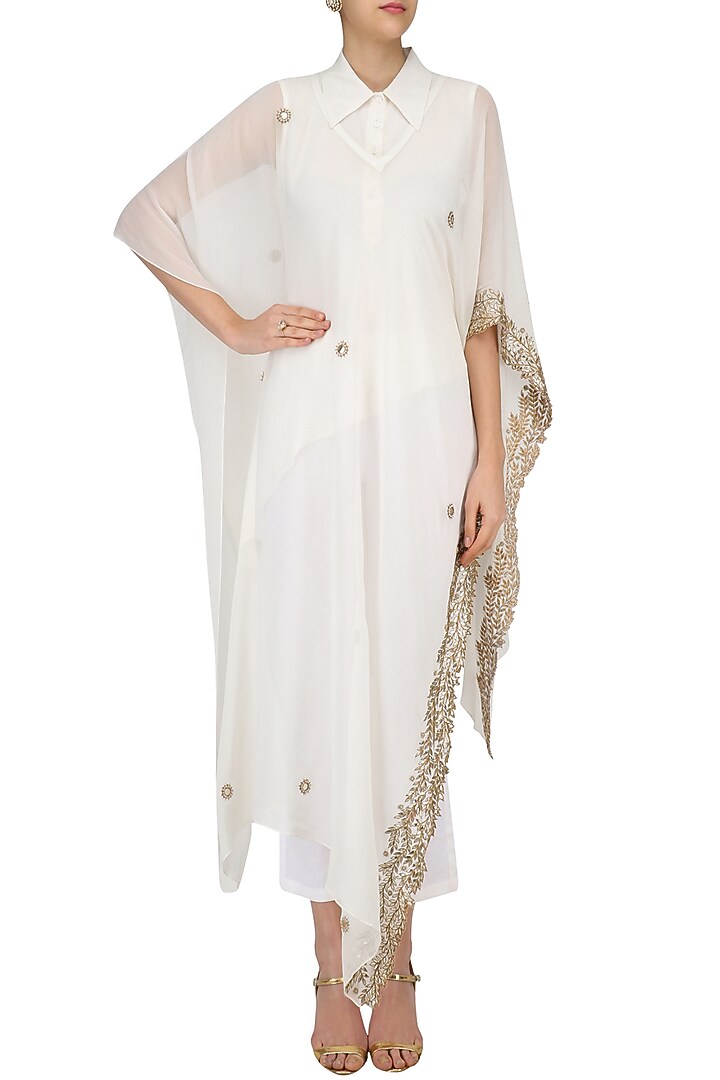 Ivory embroidered cape, shirt and pants set available only at Pernia's Pop Up Shop.