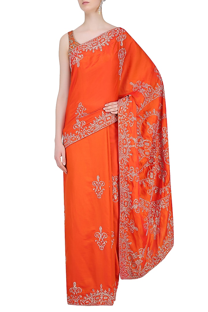 Orange sequins embellished saree with blouse available only at Pernia's Pop Up Shop.