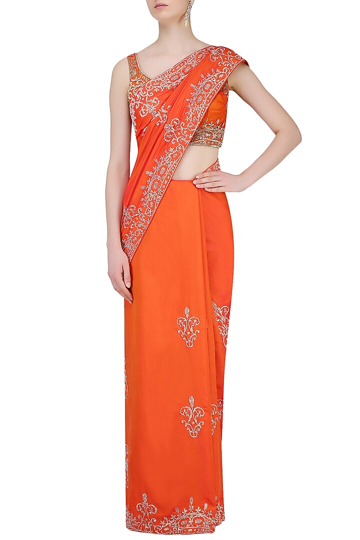 Orange sequins embellished saree with blouse available only at Pernia's Pop Up Shop.