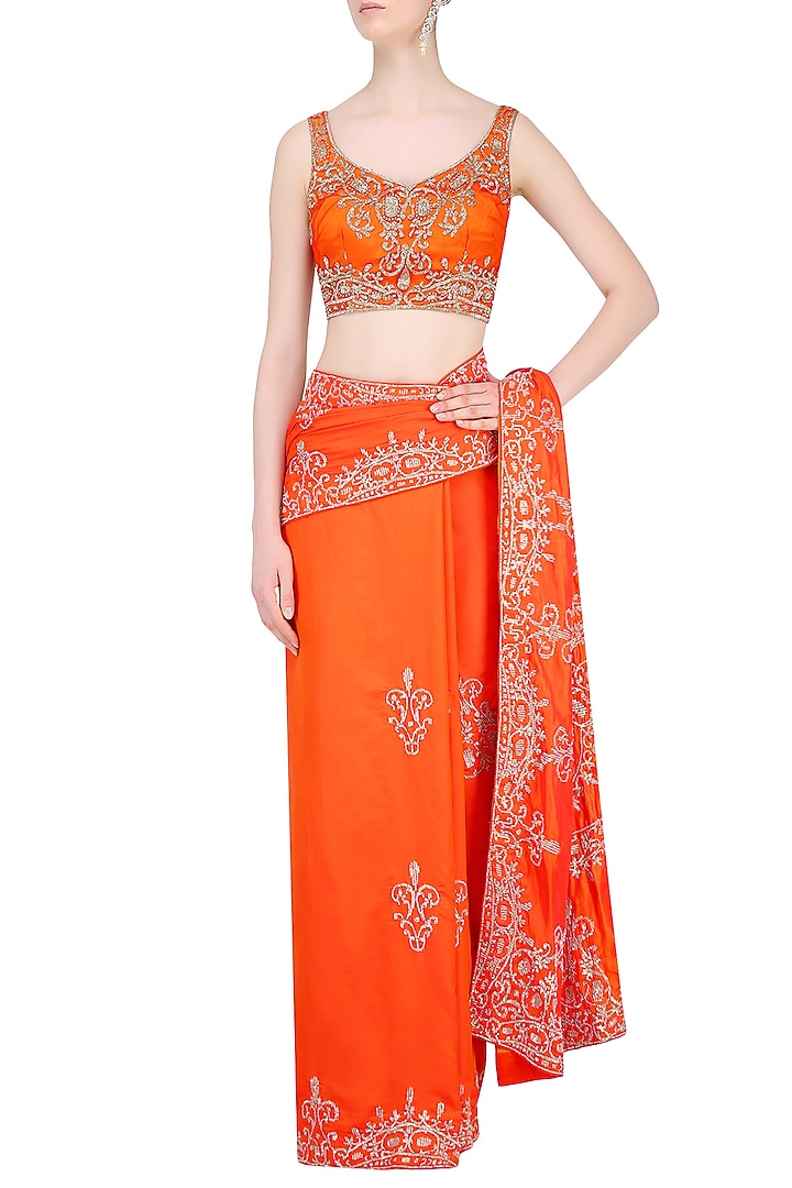 Orange sequins embellished saree with blouse available only at Pernia's Pop Up Shop.