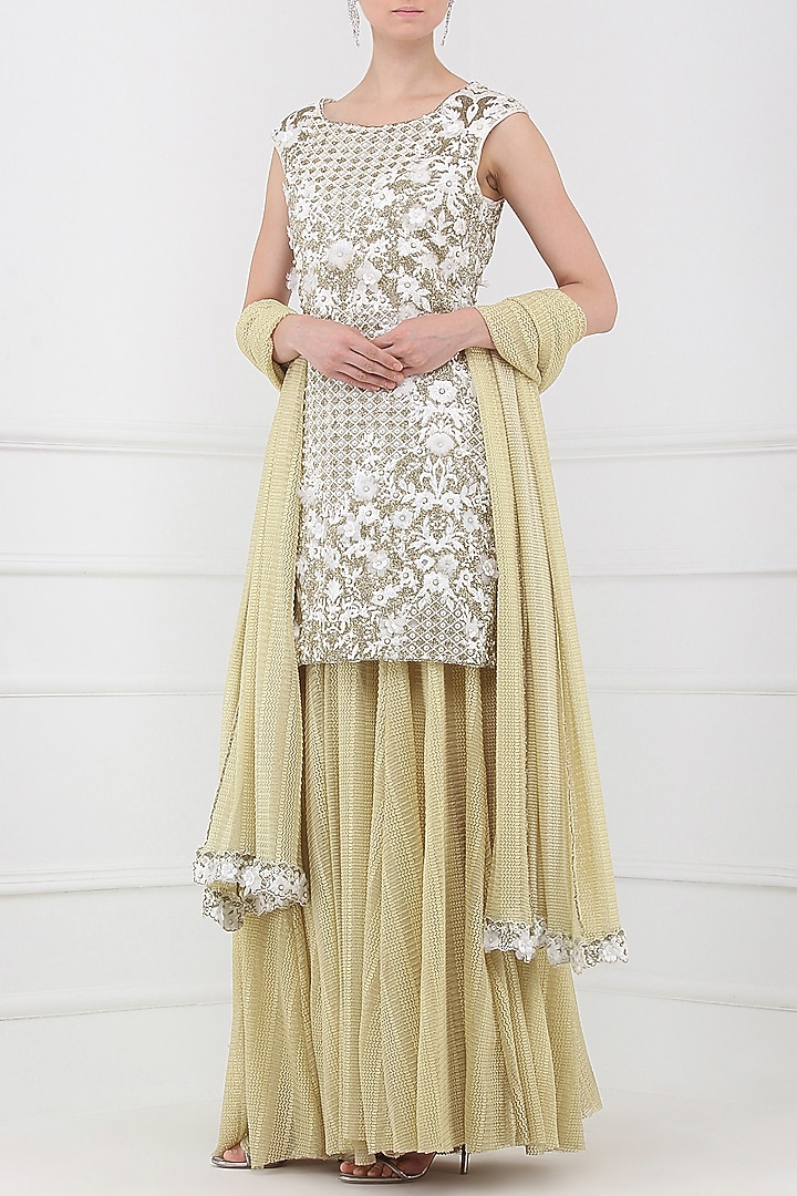 Ivory and gold embroidered sharara pants set available only at Pernia's Pop Up Shop.