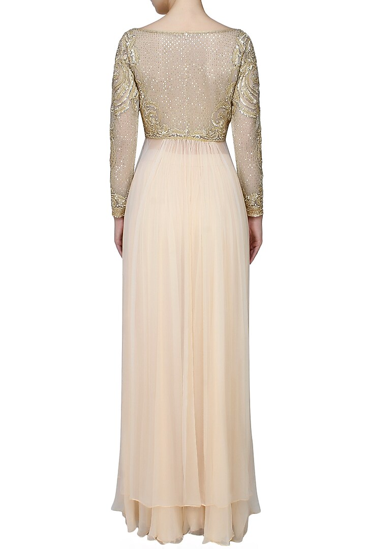 Ivory embroidered drape top with ivory pleated trousers available only at Pernia's Pop Up Shop.