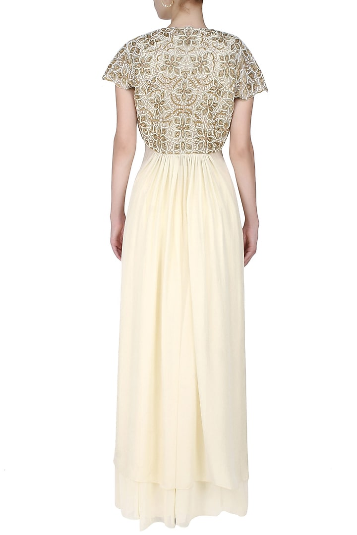 Ivory embroidered bolero with drape top and ivory pleated trousers available only at Pernia's Pop Up Shop.