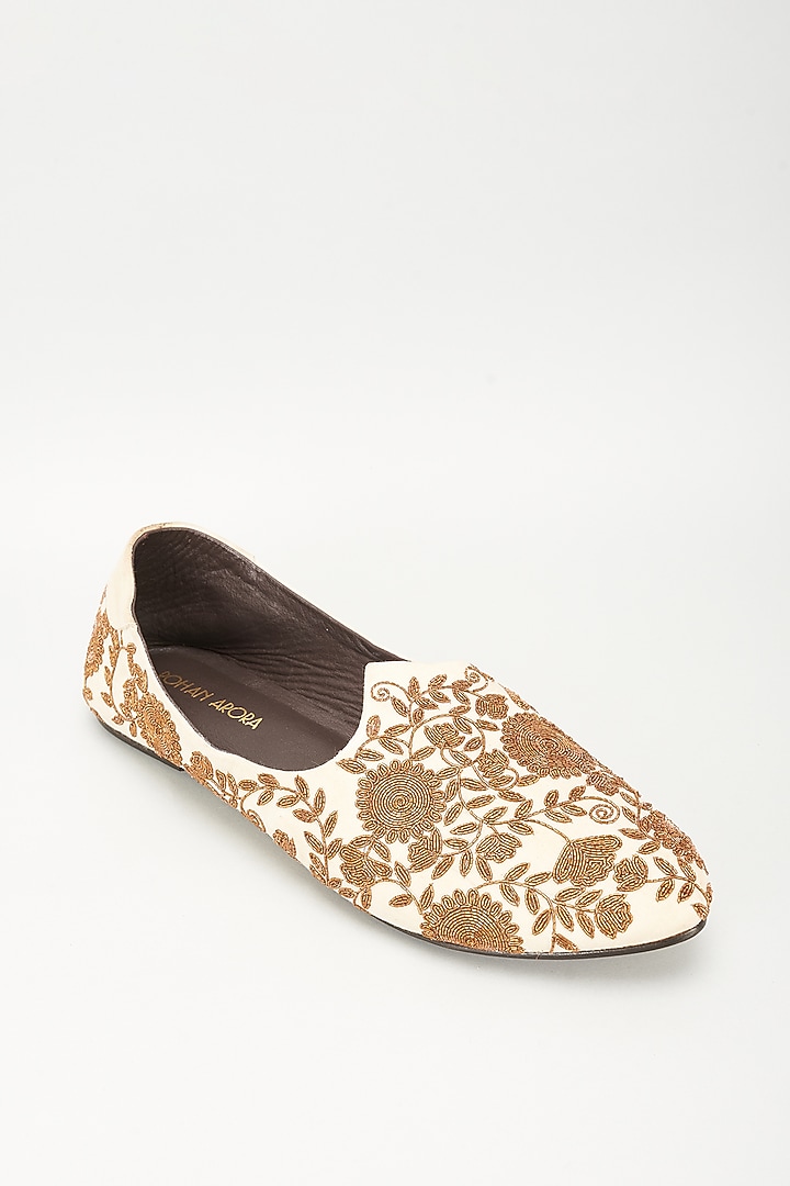 Ivory Leather Embellished Mojaris by ROHAN ARORA at Pernia's Pop Up Shop