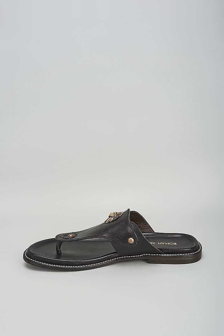 Black Leather Embellished Sandals by ROHAN ARORA at Pernia's Pop Up Shop