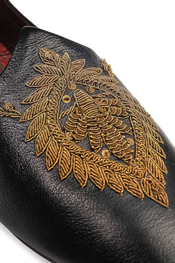 Black Leather Embellished Mojris by ROHAN ARORA at Pernia's Pop Up Shop