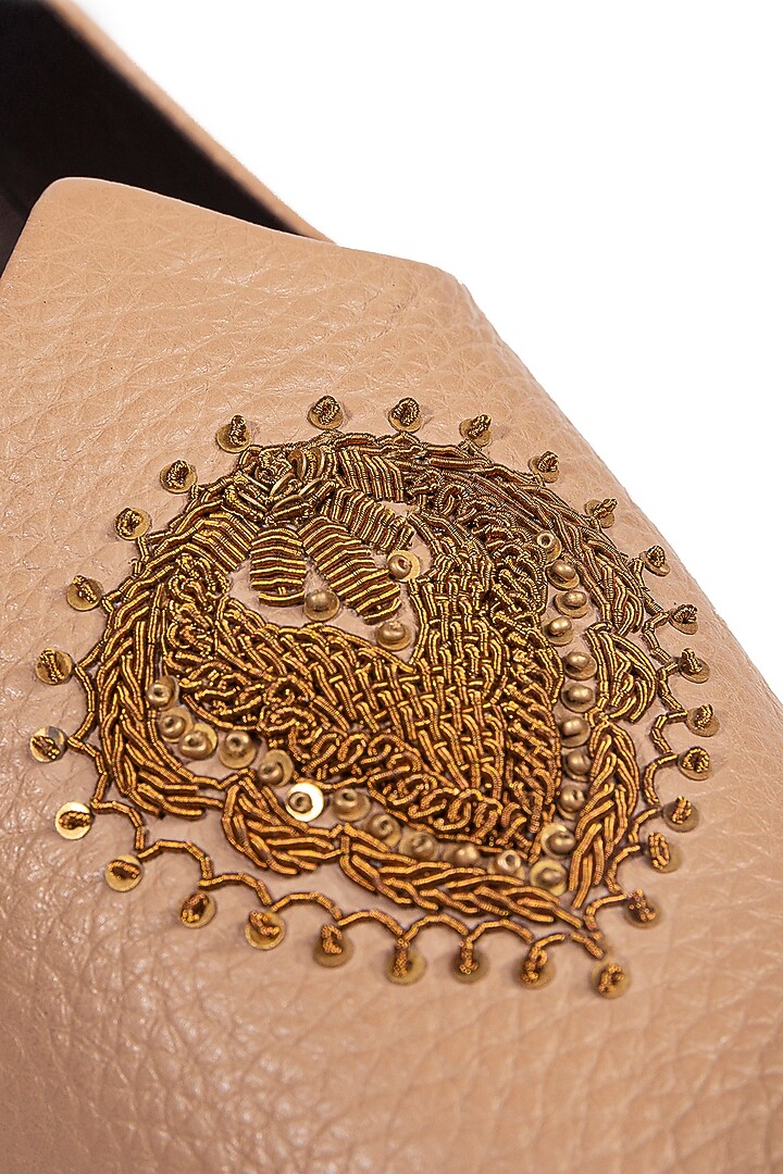 Beige Leather Embellished Mojris by ROHAN ARORA at Pernia's Pop Up Shop