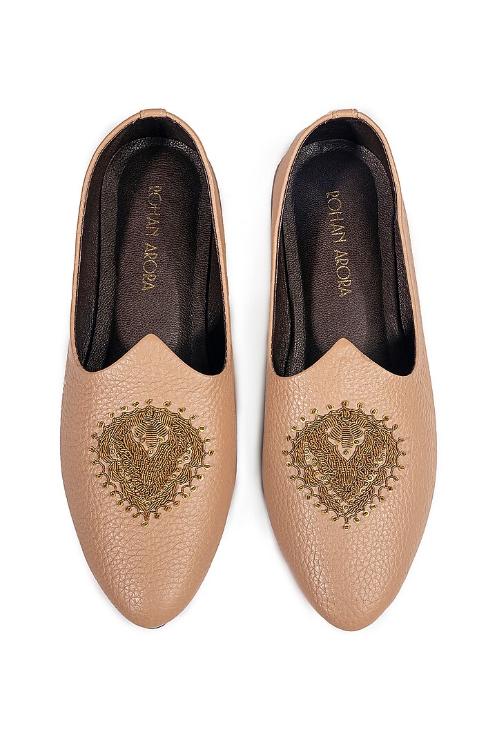 Beige Leather Embellished Mojris by ROHAN ARORA at Pernia's Pop Up Shop