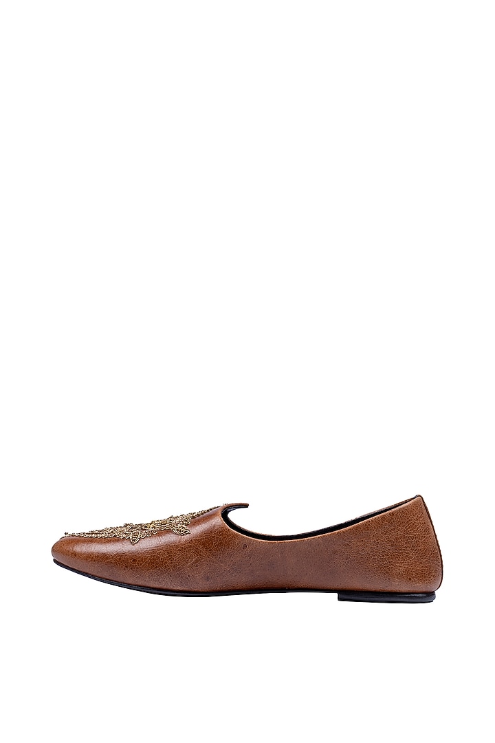 Tan Leather Embellished Mojris by ROHAN ARORA at Pernia's Pop Up Shop