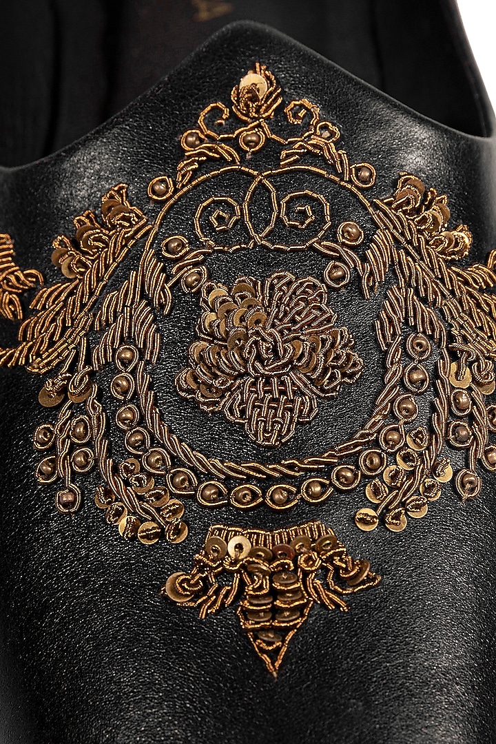 Black Leather Embellished Mojris by ROHAN ARORA at Pernia's Pop Up Shop