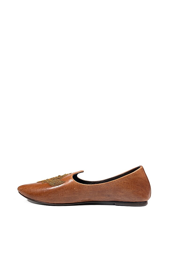 Tan Leather Embellished Mojris by ROHAN ARORA at Pernia's Pop Up Shop