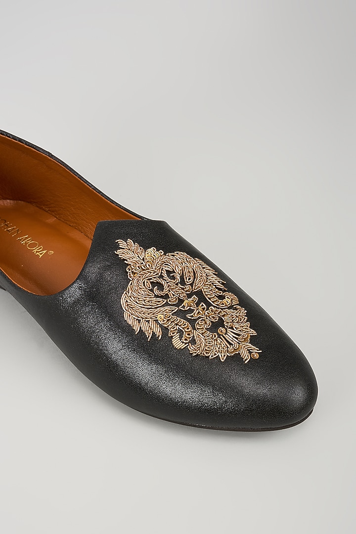 Black Leather Embellished Mojris by ROHAN ARORA at Pernia's Pop Up Shop