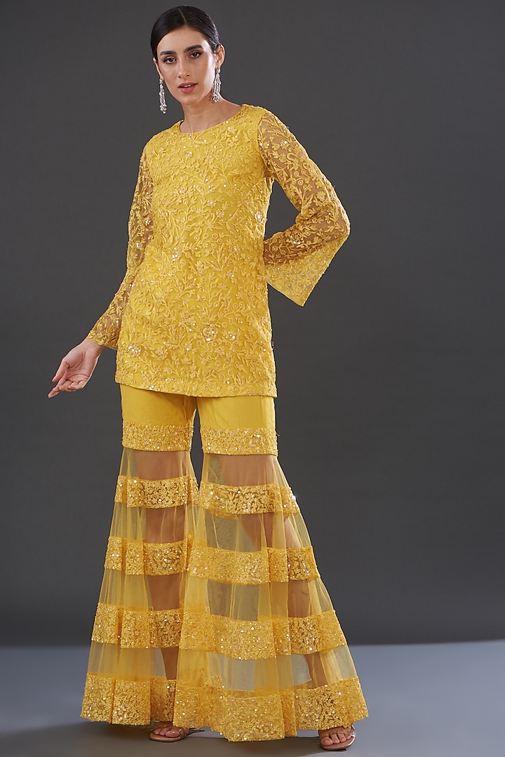 Yellow Net Embroidered Sharara Set by Rococo by raghvi