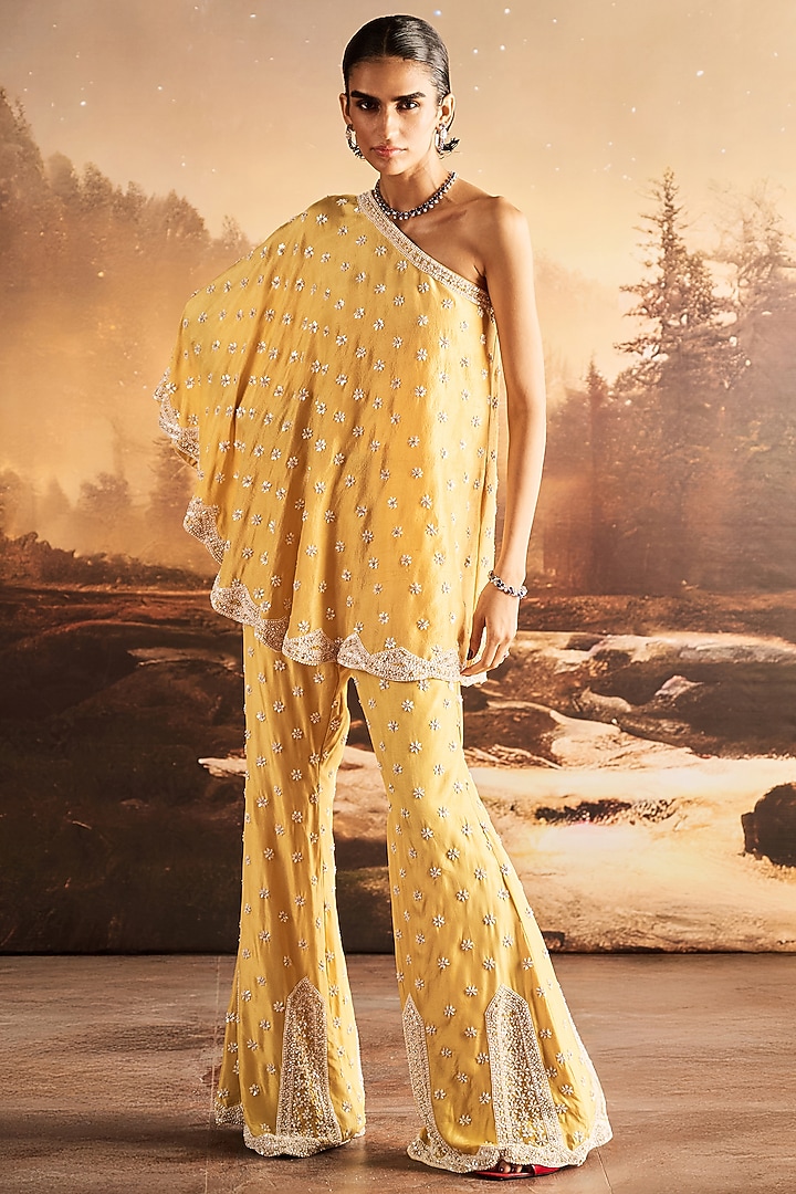 Mustard Silk Sequins Embroidered One-Shoulder Cape Set by Rococo By Raghvi at Pernia's Pop Up Shop