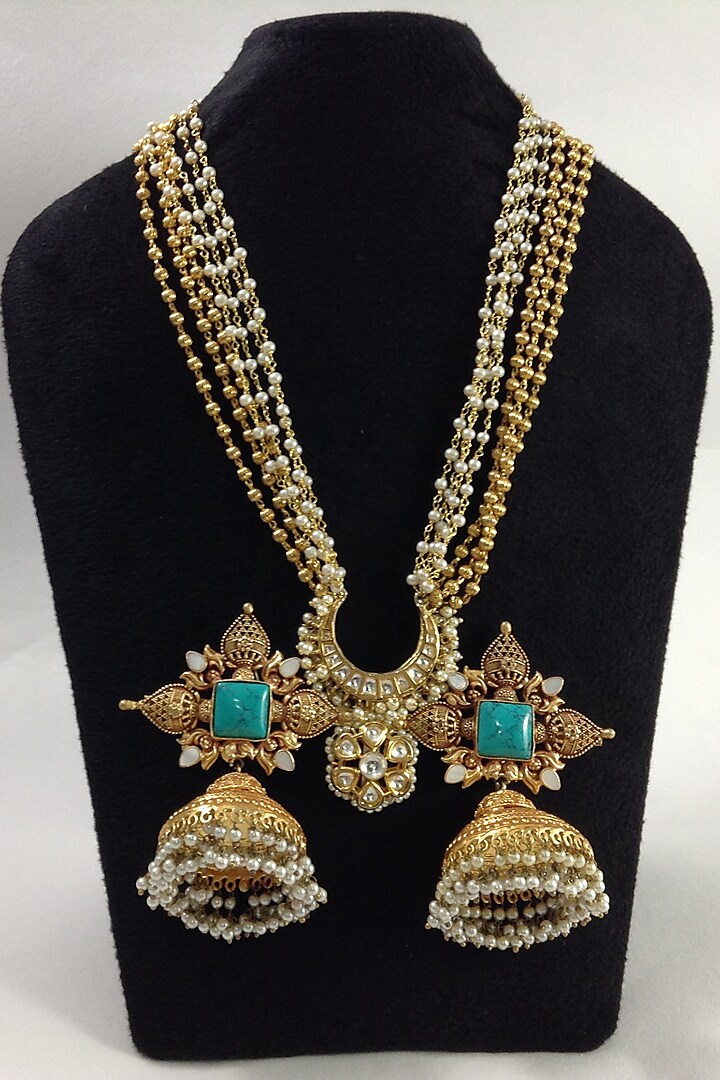 Gold Finish Temple Pendant Necklace by Rohita And Deepa at Pernia's Pop Up Shop