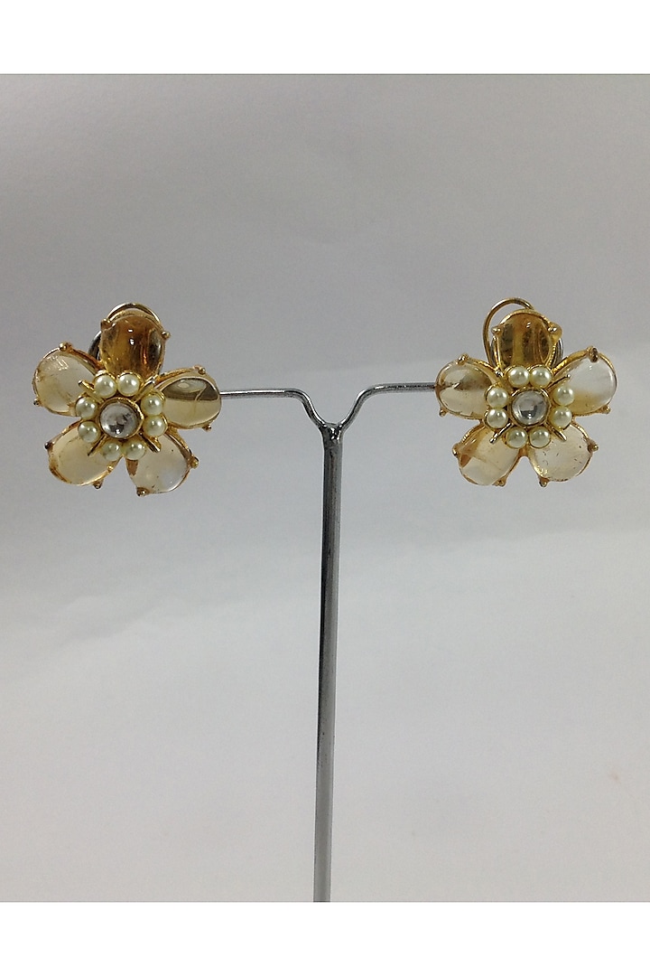 Gold Finish Topaz Stud Earrings by Rohita And Deepa