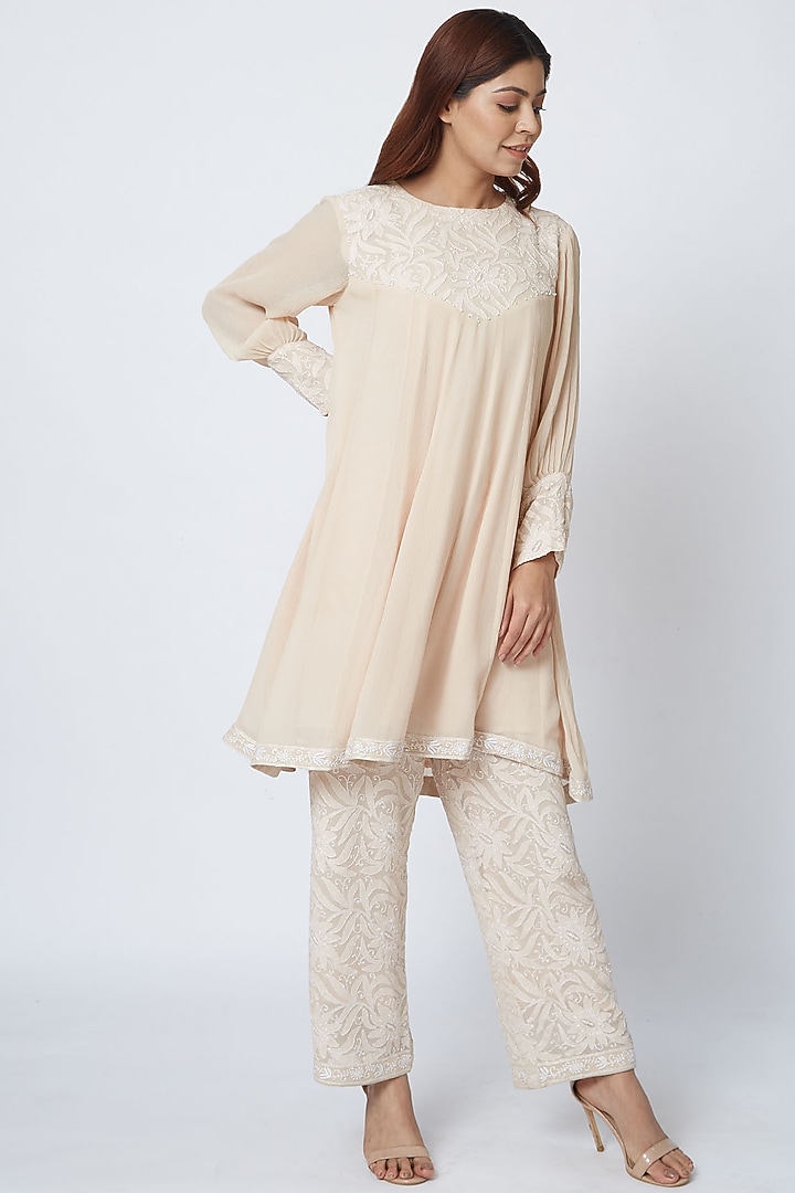 Beige Hand Embroidered Palazzo Pant Set by Romaa at Pernia's Pop Up Shop