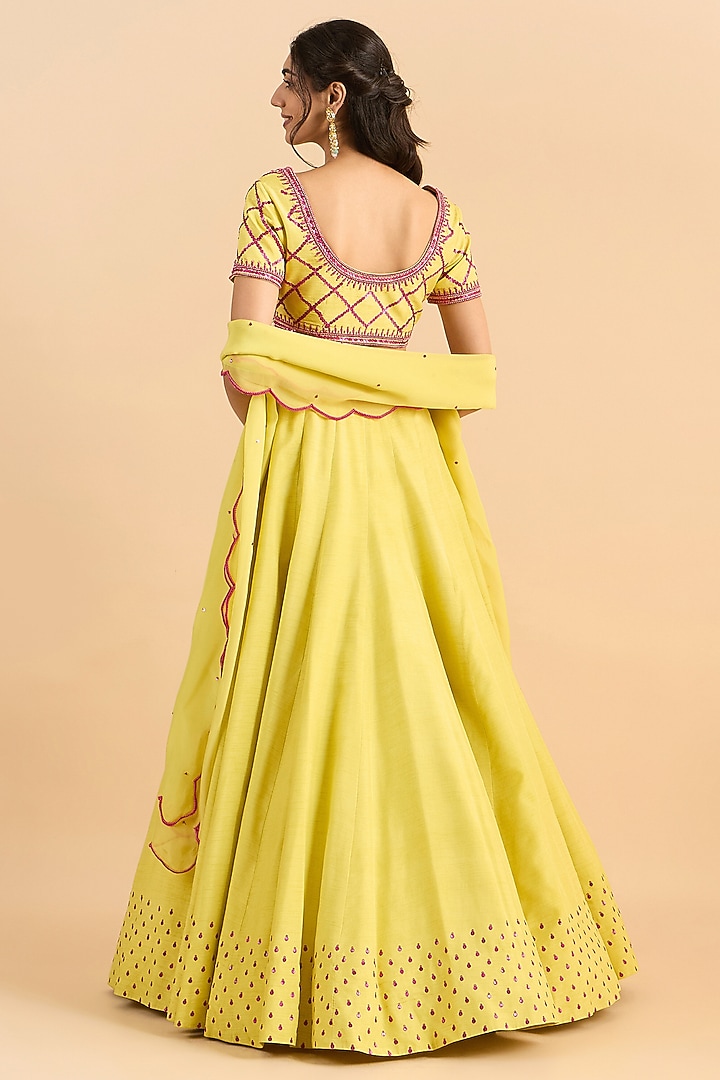 Yellow Pure Viscose Raw Silk Embroidered Wedding Lehenga Set by RoohbyRidhimaa at Pernia's Pop Up Shop