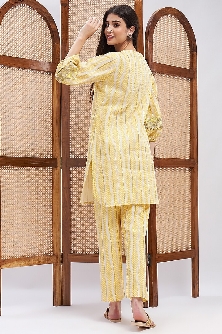 Yellow Cotton Hand Embroidered Kurta Set by RoohbyRidhimaa at Pernia's Pop Up Shop