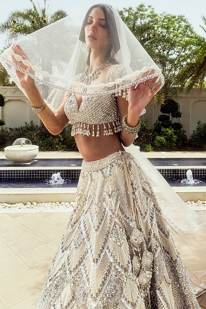 Ivory Net Sequin & Pearl Embroidered Bridal Bridal Lehenga Set by ROQA | Siddharth Khurana & Kartik Khurana at Pernia's Pop Up Shop