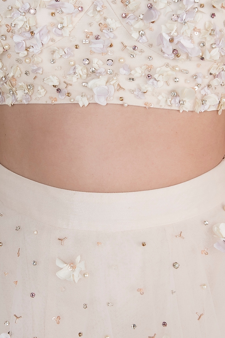 White Embellished Blouse With Layered Skirt by Rozina at Pernia's Pop Up Shop