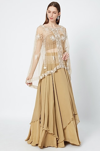 Golden Layered Skirt With Blouse & Embroidered Cape by Rozina