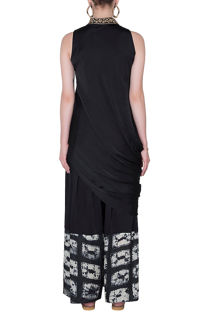 Black Drape Top With Printed Pants by Roshni Chopra at Pernia's Pop Up Shop