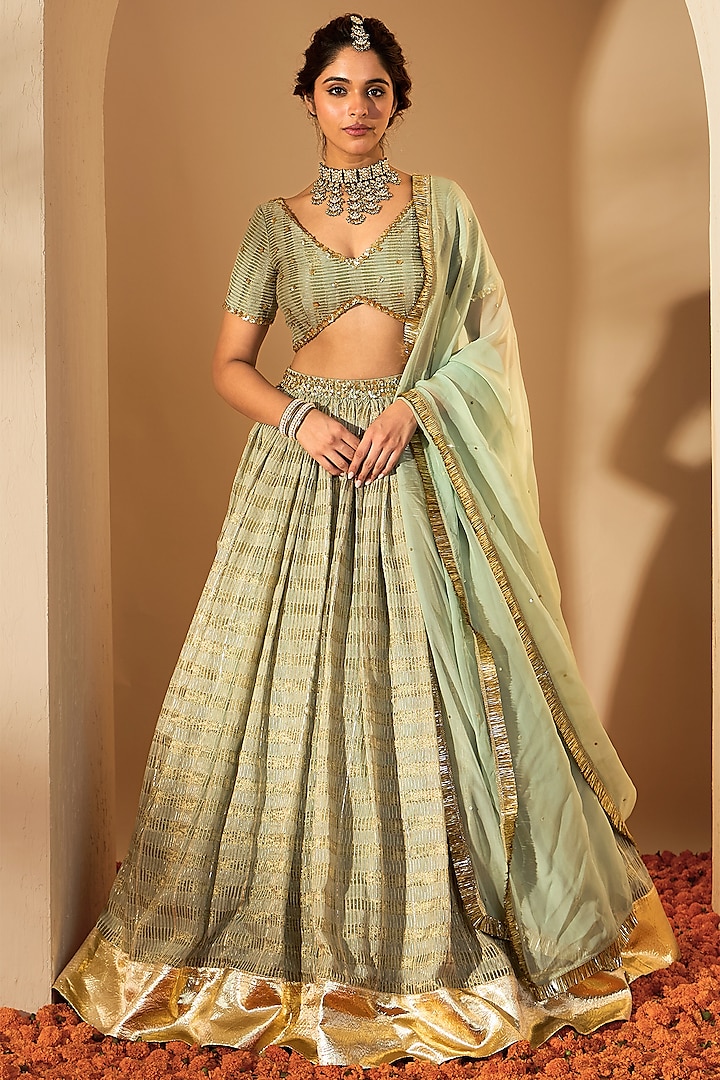 Sage Green Silk Chanderi & Silk Organza Sequins Hand Embroidered Wedding Lehenga Set by RoohbyRidhimaa at Pernia's Pop Up Shop