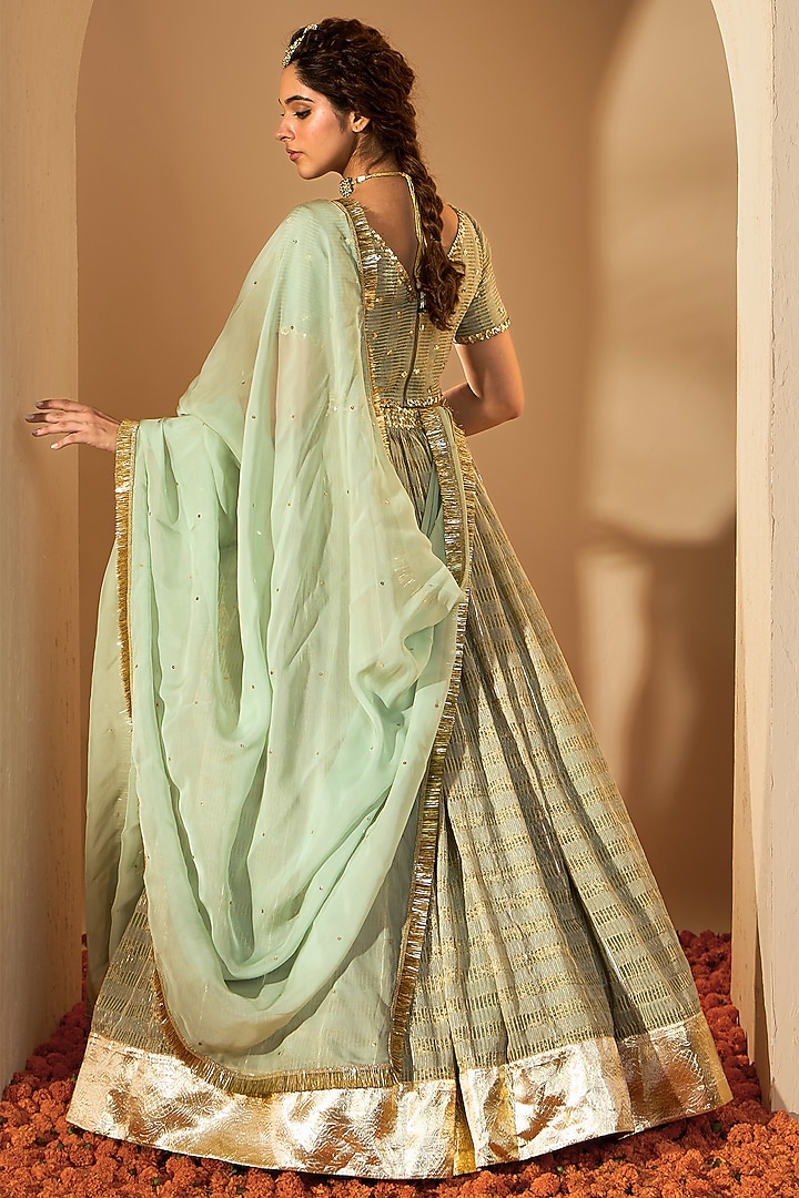 Sage Green Silk Chanderi & Silk Organza Sequins Hand Embroidered Wedding Lehenga Set by RoohbyRidhimaa at Pernia's Pop Up Shop