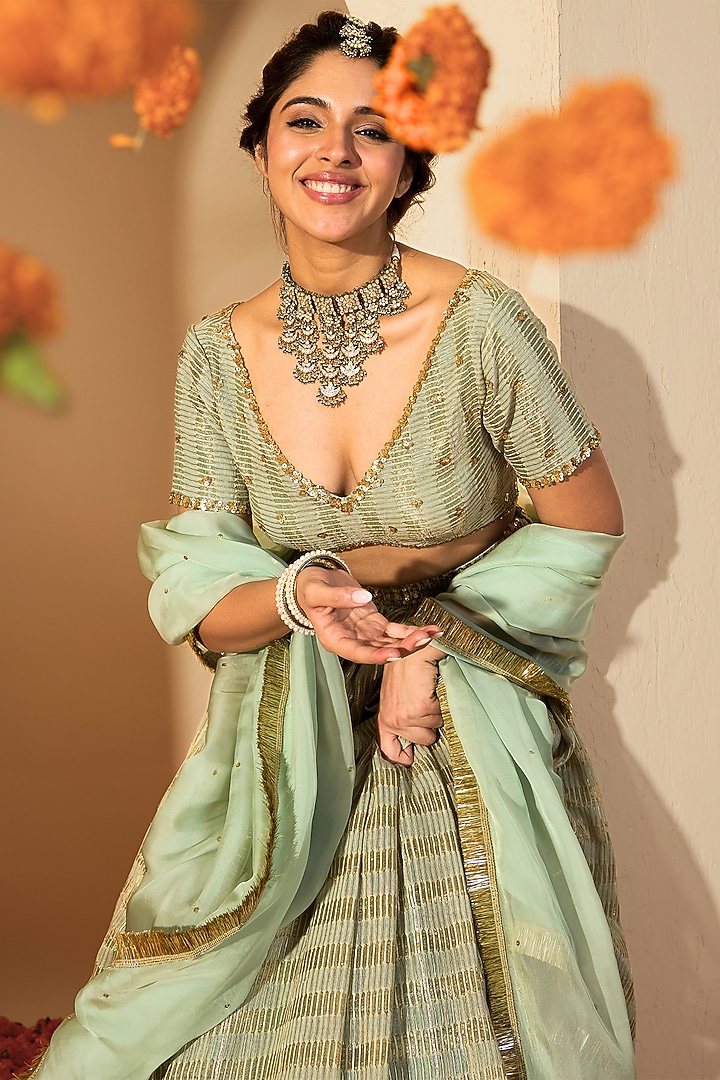 Sage Green Silk Chanderi & Silk Organza Sequins Hand Embroidered Wedding Lehenga Set by RoohbyRidhimaa at Pernia's Pop Up Shop