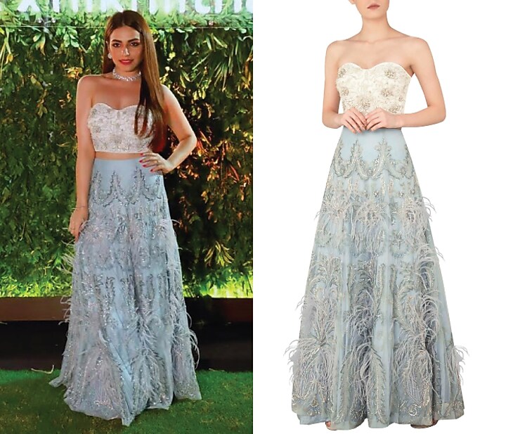 Off white embroidered bustier with sky blue lehenga skirt available only at Pernia's Pop Up Shop.