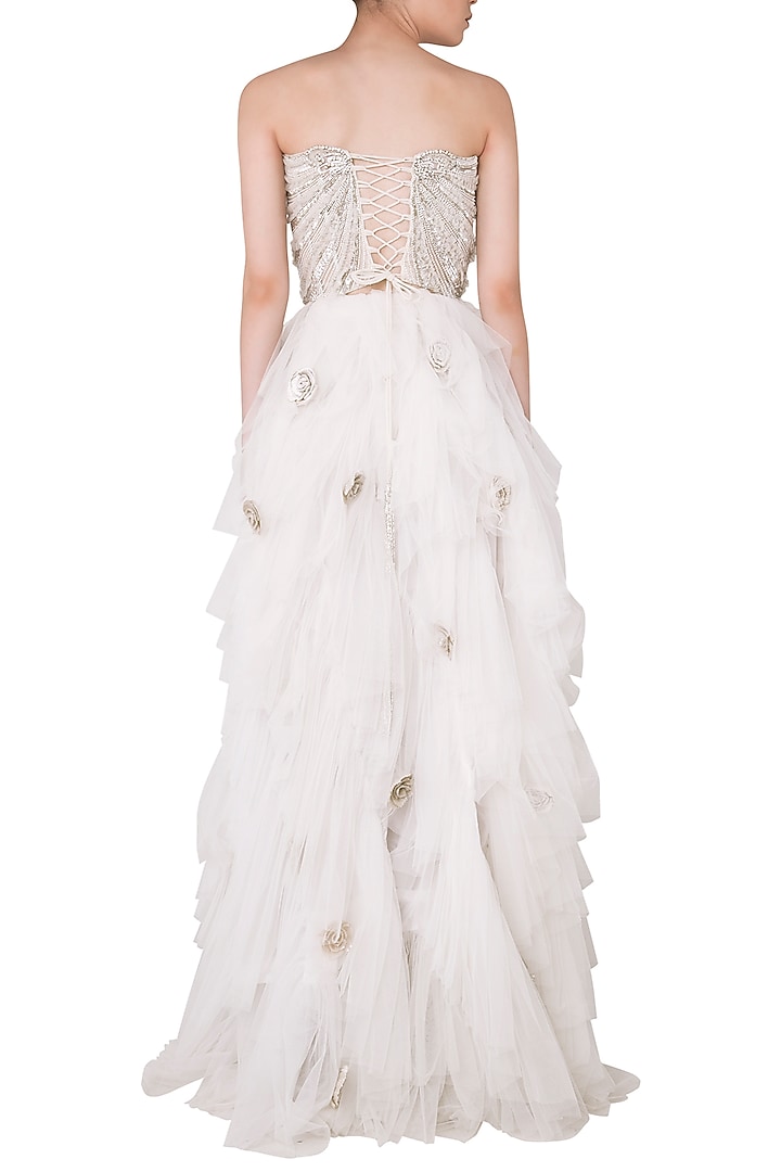 Off white embroidered corset with lehenga skirt available only at Pernia's Pop Up Shop.
