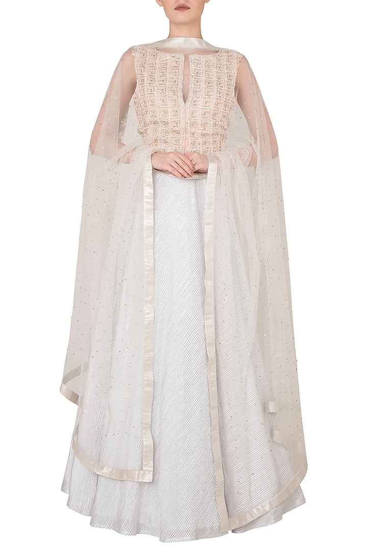 Off white and pink embroidered lehenga set available only at Pernia's Pop Up Shop.