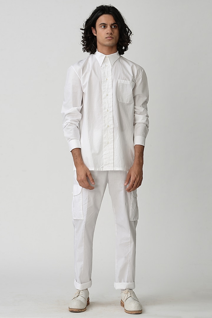 White Tapered Pants by Rajesh Pratap Singh Men